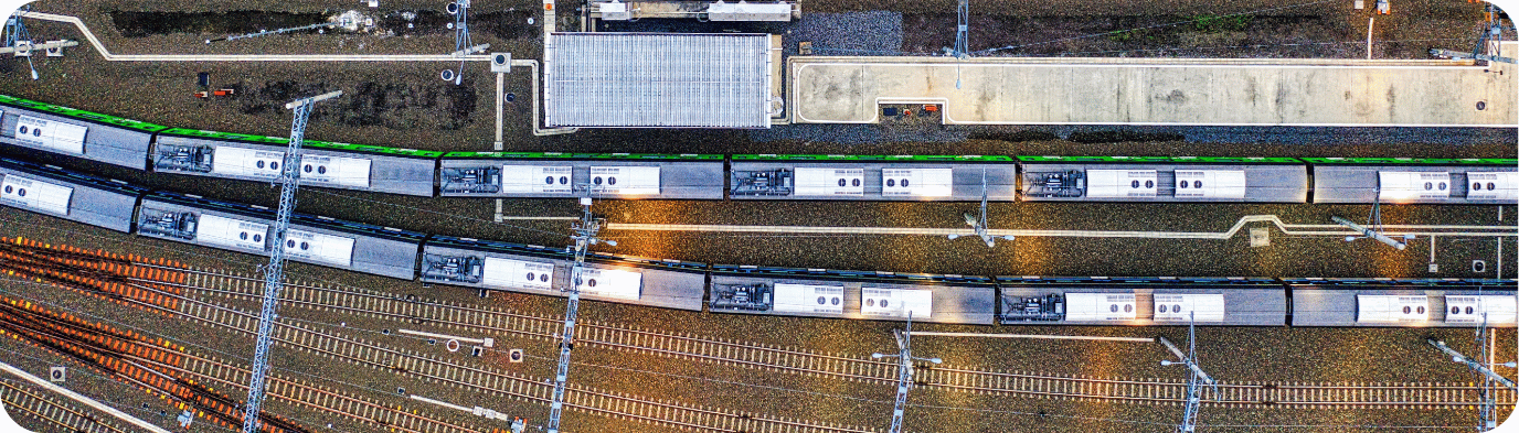 Drone shot capturing trains at a Jakarta railway station